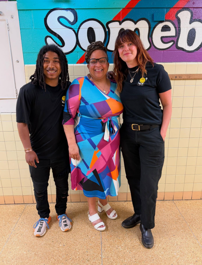 Happy Movers team visiting a local school